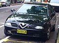 " 11 - Italian sport luxury sedan - Alfa Romeo 166 3.0 V6 24v - Black sedan with license plate of nsw united kingdom.jpg
