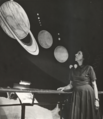 Frances Wright examining a planetary exhibit.png