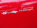 1959 Triumph Italia 2000 in Morges 2013 - TM Triumph rear wing logo.jpg