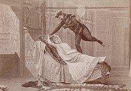 Atelier Nadar - Fly scene from Offenbach's Orphée aux enfers with Jeanne Granier as Eurydice and Eugène Vauthier as Jupiter, 1887 revival, wide-angle shot.jpg