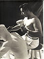 Carbonell carving Fin de una Raza, in his Havana studio, 1952.jpg